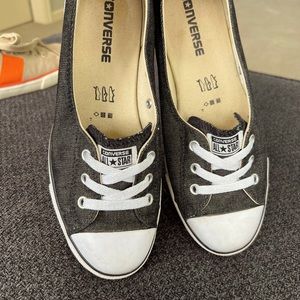 Converse slip on sneakers.